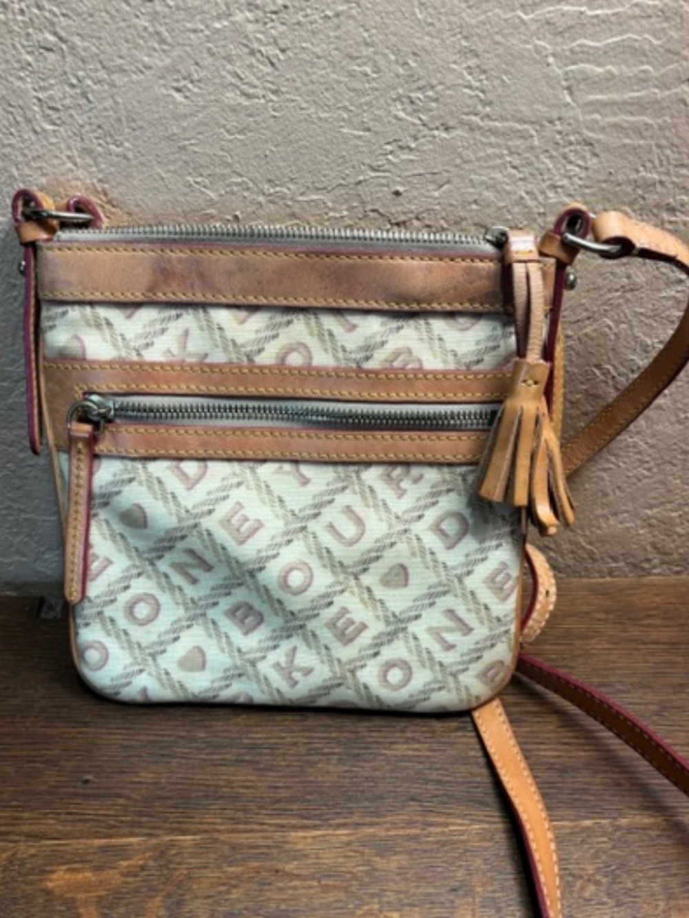 Dooney Bourke yellow crossword letter carrier Crossbody Bag